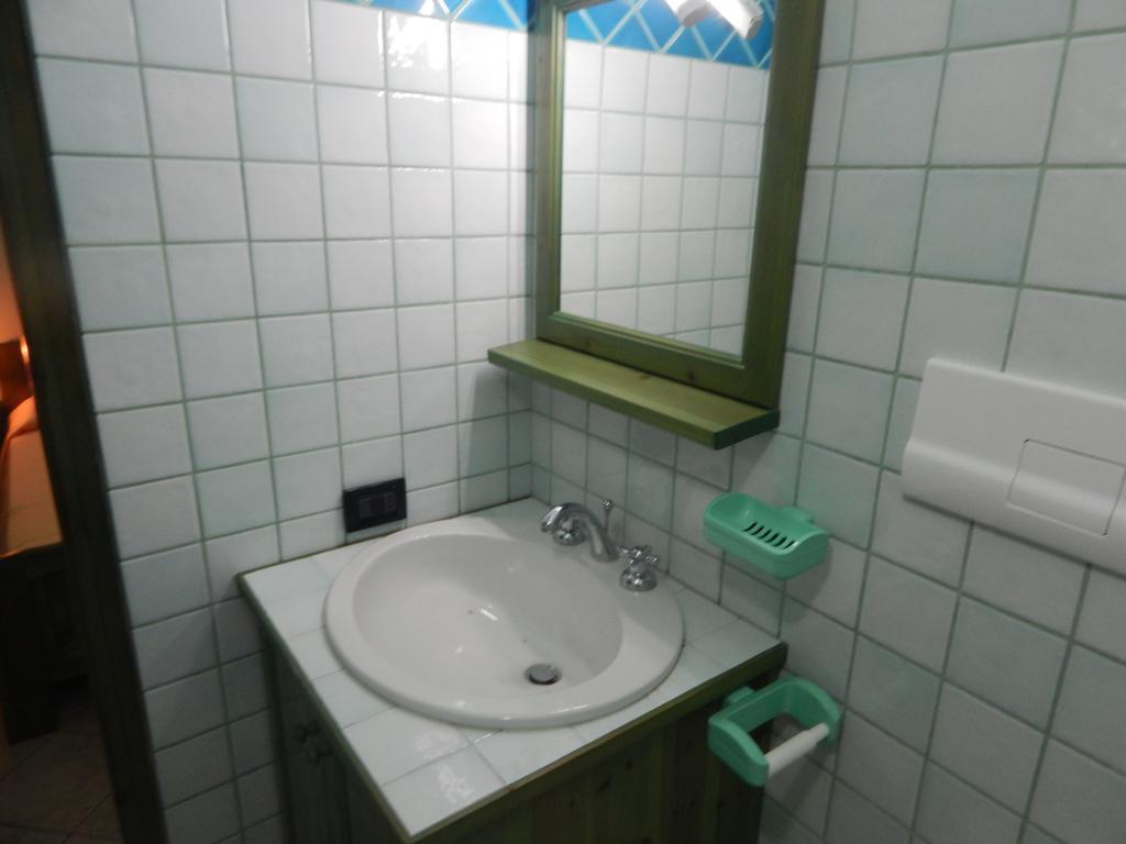 Appartamento Magnolia Cala Liberotto Ruang foto