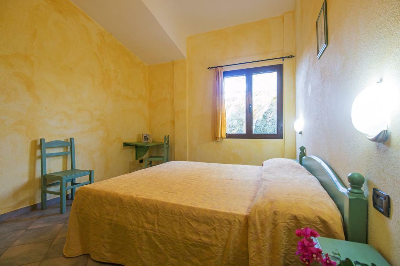 Appartamento Magnolia Cala Liberotto Bagian luar foto