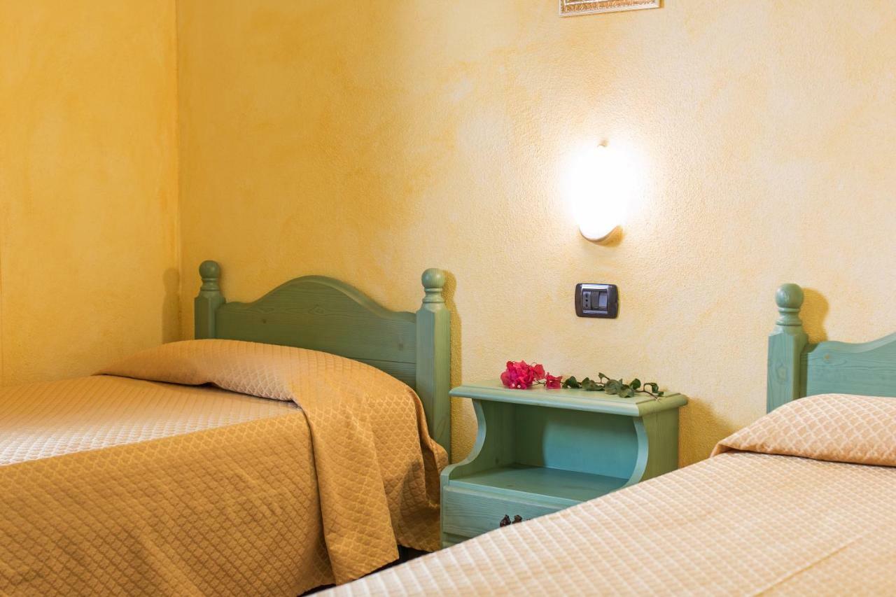 Appartamento Magnolia Cala Liberotto Bagian luar foto