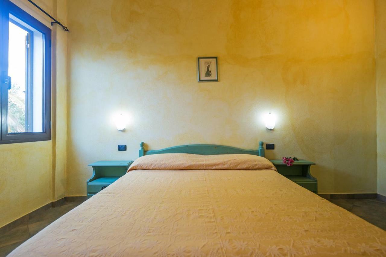 Appartamento Magnolia Cala Liberotto Bagian luar foto